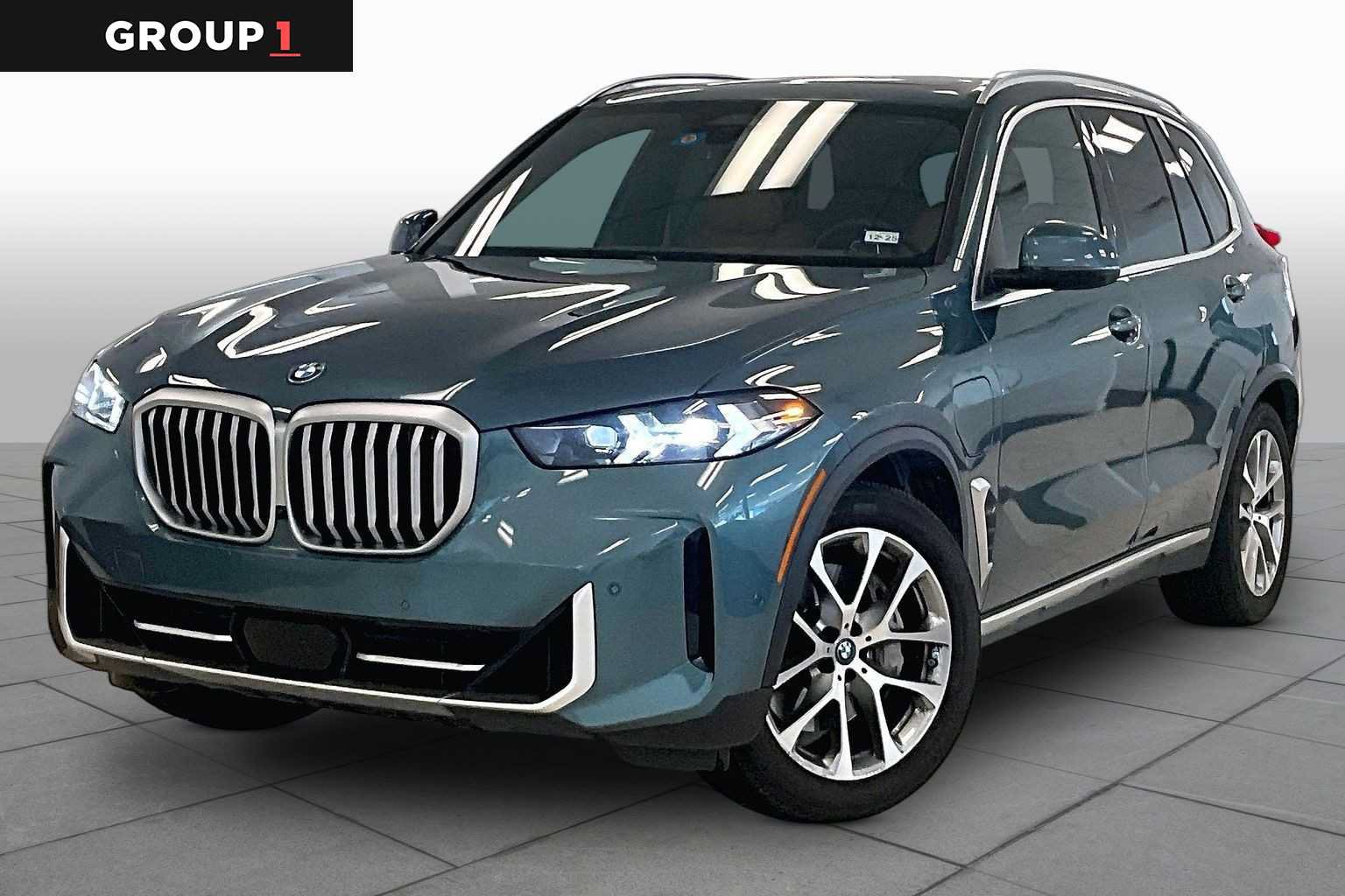 Used 2024 BMW X5 xDrive50e w/ Parking Assistance Package AWD/4WD image 1