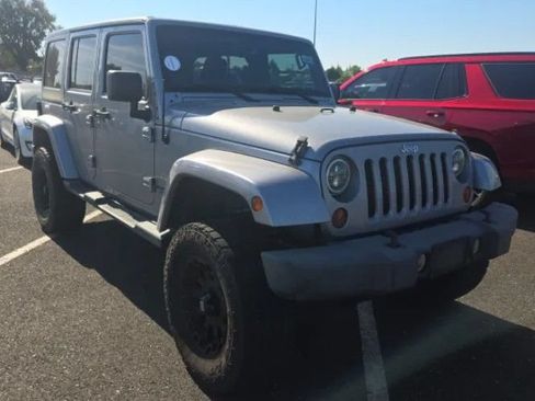 Used 2013 Jeep Wrangler Unlimited Sahara w/ Connectivity Group AWD/4WD image 1