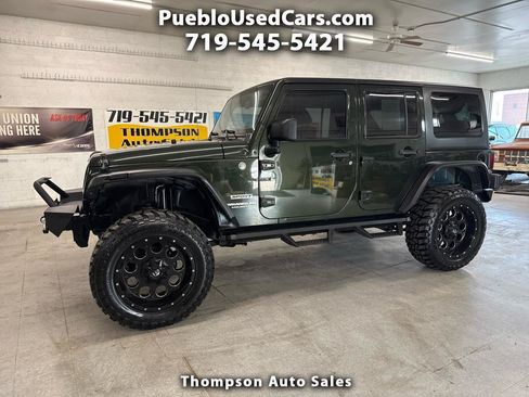 Used 2012 Jeep Wrangler Unlimited Sport AWD/4WD image 1