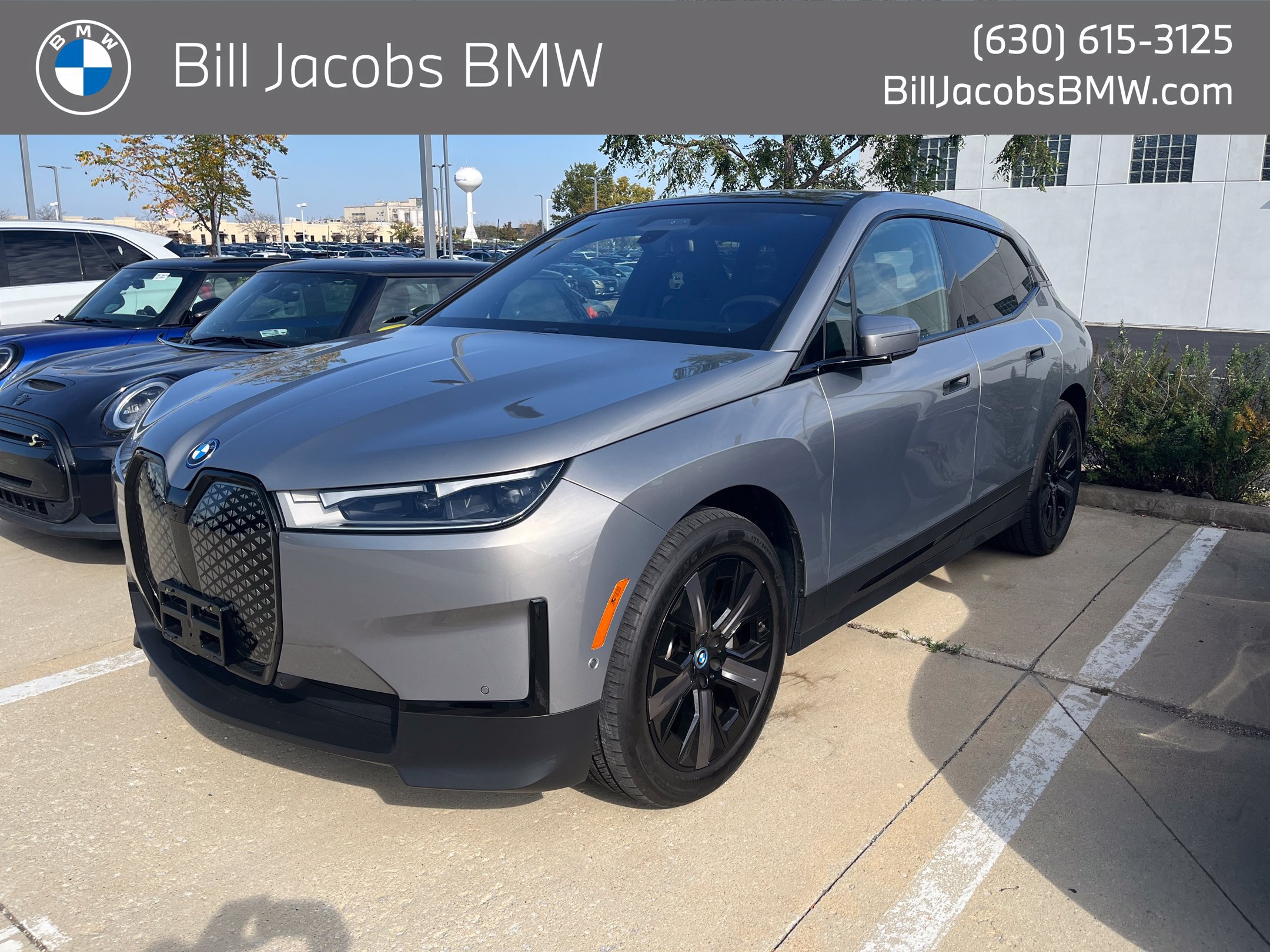 Used 2024 BMW iX xDrive50 w/ Premium Package AWD/4WD image 1
