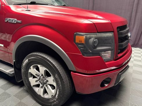 Used 2014 Ford F150 FX4 Pickup 4D 6 1/2 ft w/ Equipment Group 402A Luxury AWD/4WD image 9