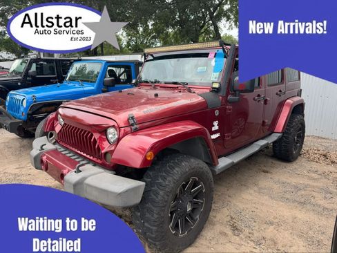 Used 2012 Jeep Wrangler Unlimited Sahara AWD/4WD image 1
