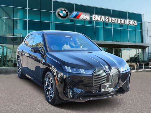 Used 2026 BMW iX xDrive60 w/ Premium Package image 3