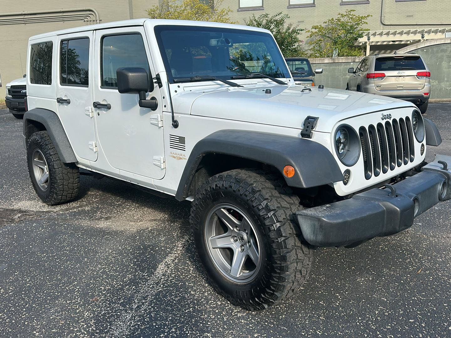 Used 2013 Jeep Wrangler Unlimited Sahara AWD/4WD image 1
