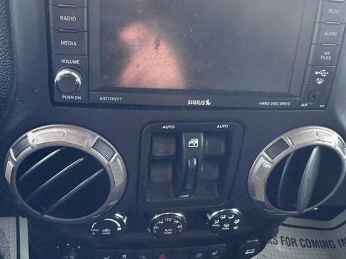 Used 2013 Jeep Wrangler Unlimited Sahara AWD/4WD image 23