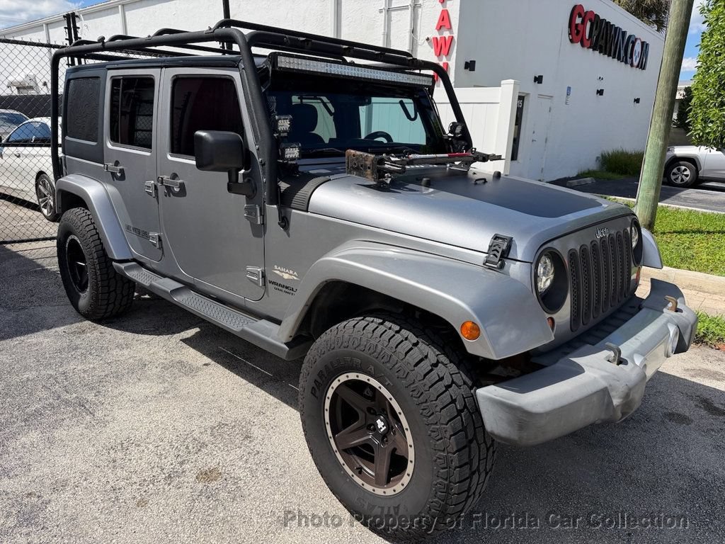 Used 2013 Jeep Wrangler Unlimited Sahara w/ Connectivity Group AWD/4WD image 2