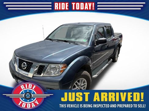 Used 2014 Nissan Frontier SV AWD/4WD image 1