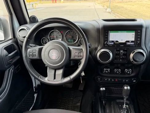Used 2013 Jeep Wrangler Unlimited Sahara w/ Dual Top Group AWD/4WD image 13