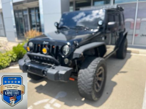 Used 2013 Jeep Wrangler Unlimited Sahara w/ Connectivity Group AWD/4WD image 1