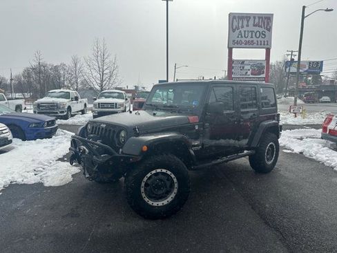 Used 2014 Jeep Wrangler Unlimited Sahara image 1