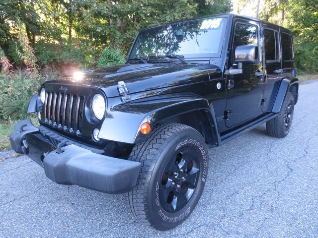 Used 2015 Jeep Wrangler Unlimited Sahara AWD/4WD image 1