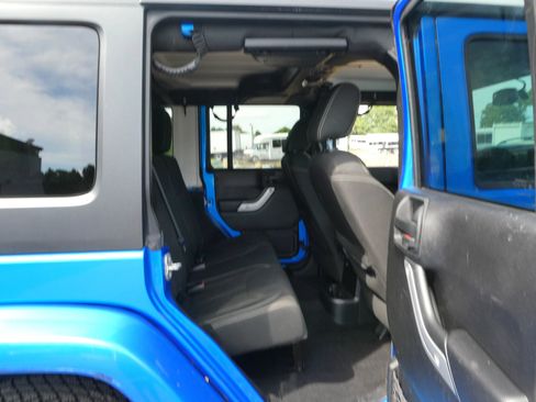 Used 2016 Jeep Wrangler Unlimited Sahara w/ Dual Top Group AWD/4WD image 25