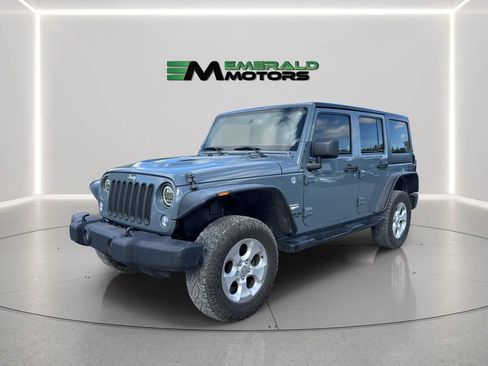 Used 2014 Jeep Wrangler Unlimited Sahara w/ Dual Top Group AWD/4WD image 1