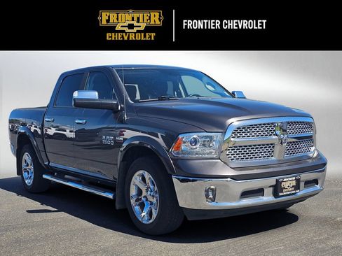 Used 2016 RAM 1500 Laramie AWD/4WD image 1