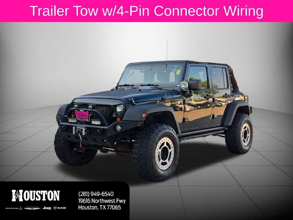 Used 2012 Jeep Wrangler Unlimited Rubicon w/ Max Tow Pkg AWD/4WD image 9