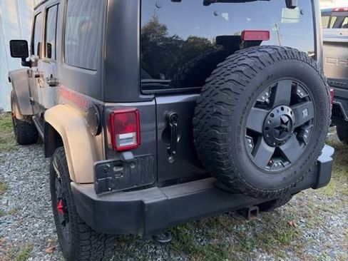 Used 2014 Jeep Wrangler Unlimited Rubicon w/ Dual Top Group AWD/4WD image 11