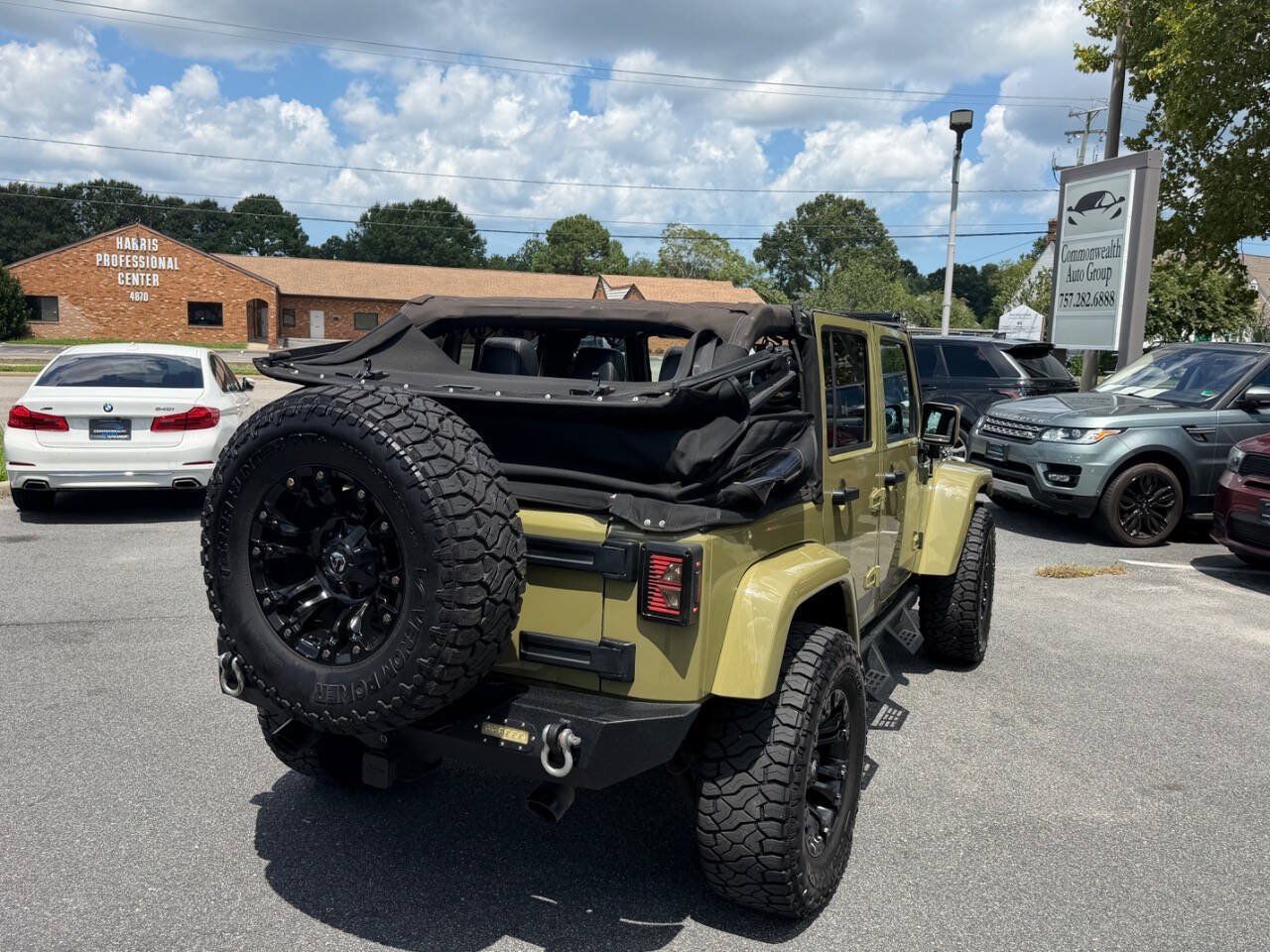 Used 2013 Jeep Wrangler Unlimited Sahara w/ Dual Top Group AWD/4WD image 29