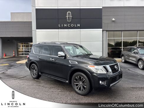 Used 2019 Nissan Armada Platinum w/ Captain's Chairs Package AWD/4WD image 1