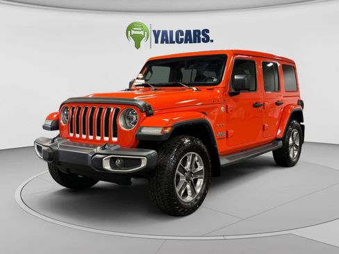 Used 2019 Jeep Wrangler Unlimited Sahara w/ Uconnect 4C Nav & Sound Group AWD/4WD image 1