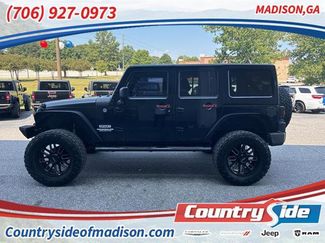 Used 2013 Jeep Wrangler Unlimited Sport image 1