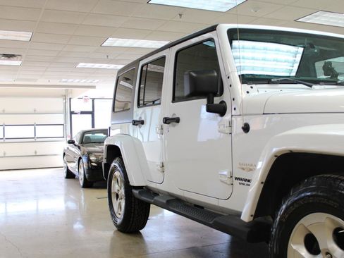 Used 2013 Jeep Wrangler Unlimited Sahara w/ Connectivity Group AWD/4WD image 9