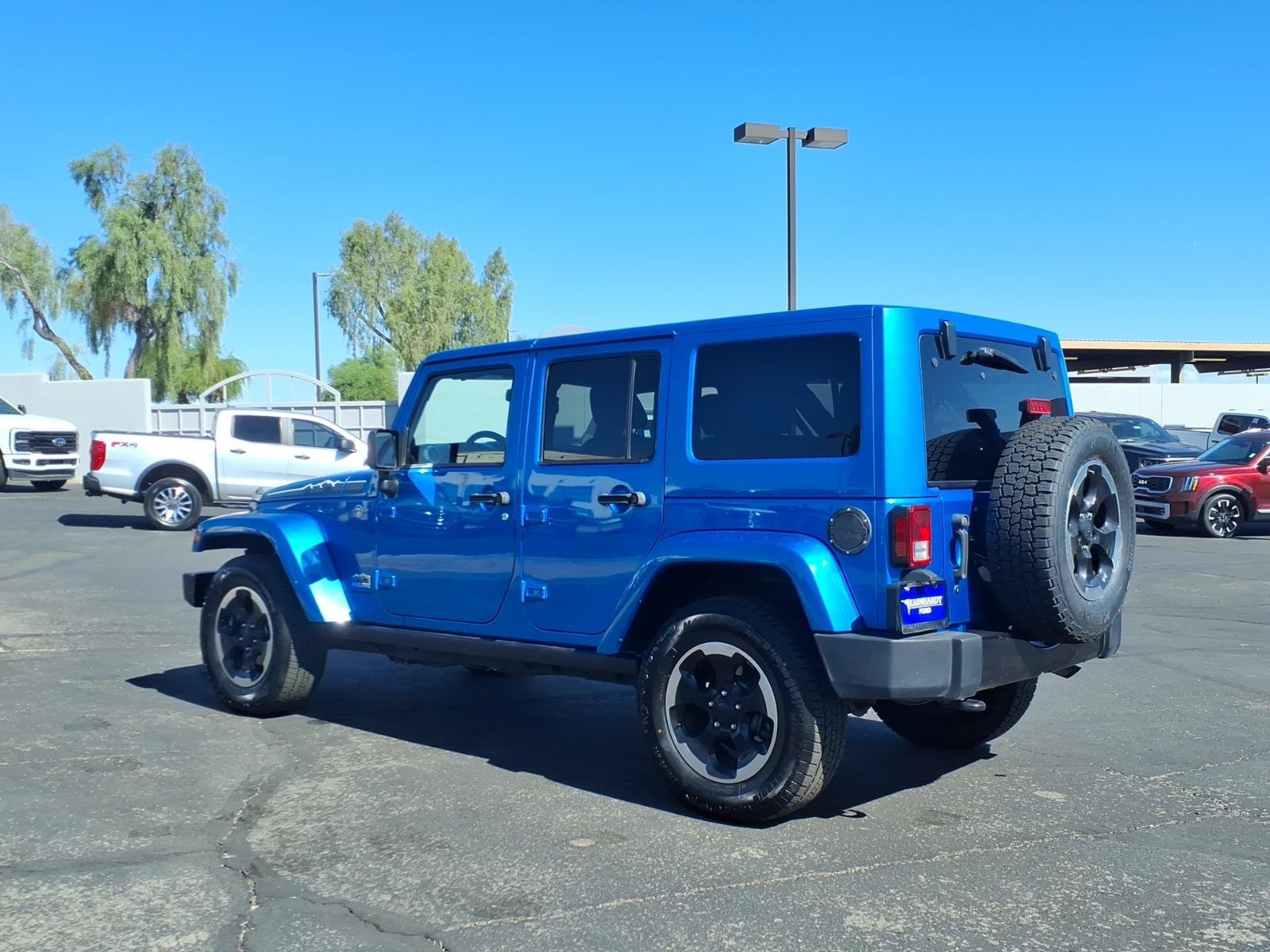 Used 2014 Jeep Wrangler Unlimited Sahara AWD/4WD image 4