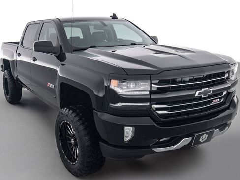 Used 2017 Chevrolet Silverado 1500 LTZ Z71 w/ Realtree Edition AWD/4WD image 1