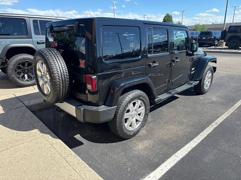 Used 2013 Jeep Wrangler Unlimited Sahara w/ Dual Top Group AWD/4WD image 3