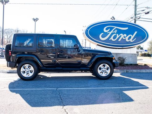 Used 2014 Jeep Wrangler Unlimited Sahara w/ Connectivity Group image 1