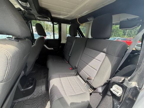 Used 2012 Jeep Wrangler Unlimited Rubicon w/ Dual Top Group AWD/4WD image 12