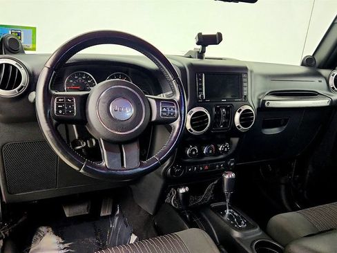 Used 2012 Jeep Wrangler Unlimited Sahara w/ Dual Top Group AWD/4WD image 13
