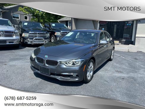 Used 2016 BMW 328i xDrive Sedan w/ Technology Package AWD/4WD image 1