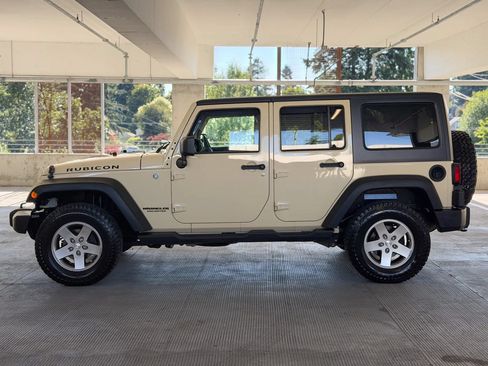 Used 2011 Jeep Wrangler Unlimited Rubicon w/ Dual Top Group AWD/4WD image 8