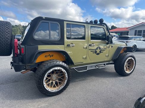Used 2013 Jeep Wrangler Unlimited Rubicon w/ Dual Top Group image 4