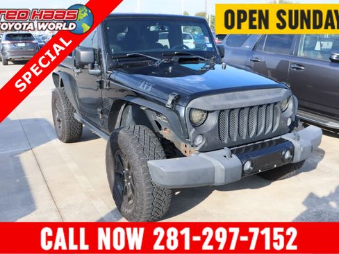 Used 2014 Jeep Wrangler Sport image 1