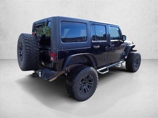 Used 2011 Jeep Wrangler Unlimited Sport AWD/4WD video 3