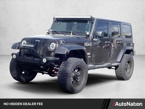 Used 2013 Jeep Wrangler Unlimited Sahara w/ Connectivity Group AWD/4WD image 1