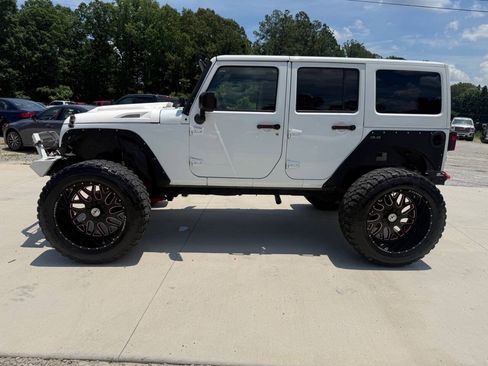 Used 2015 Jeep Wrangler Unlimited Rubicon w/ Dual Top Group AWD/4WD image 4