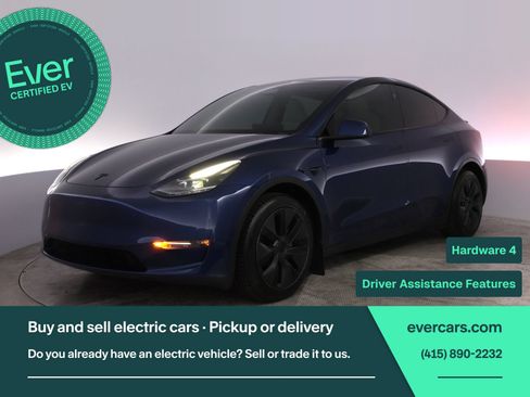 Used 2024 Tesla Model Y Long Range AWD/4WD image 1