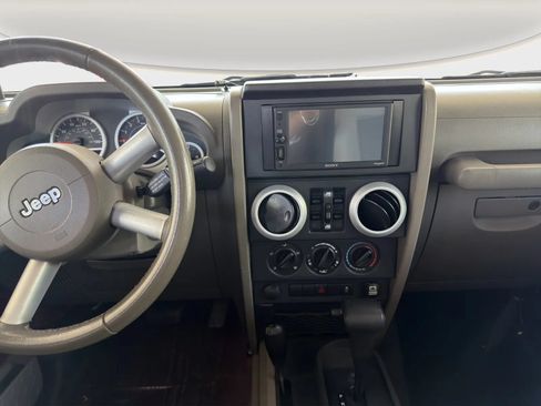 Used 2010 Jeep Wrangler Unlimited Sahara w/ Dual Top Group AWD/4WD image 15