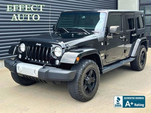 Used 2015 Jeep Wrangler Unlimited Sahara w/ Connectivity Group AWD/4WD image 1