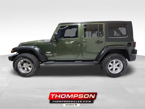 Used 2007 Jeep Wrangler Unlimited Sahara w/ Dual Top Group image 1