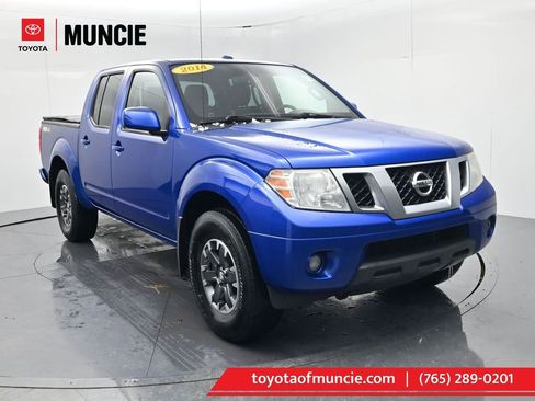 Used 2014 Nissan Frontier PRO-4X image 1