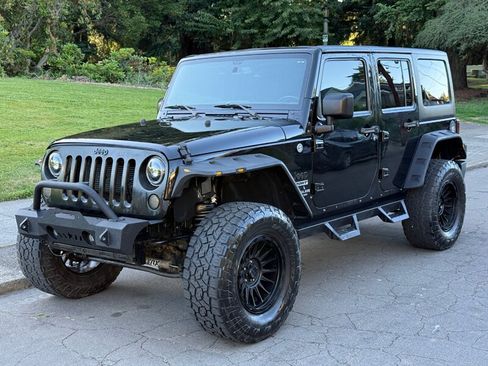 Used 2015 Jeep Wrangler Unlimited Sport AWD/4WD image 1