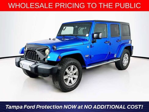 Used 2015 Jeep Wrangler Unlimited Sahara w/ Dual Top Group AWD/4WD image 1