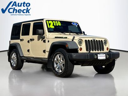Used 2012 Jeep Wrangler Unlimited Sport w/ Dual Top Group
