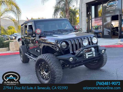 Used 2018 Jeep Wrangler Unlimited Sport image 1