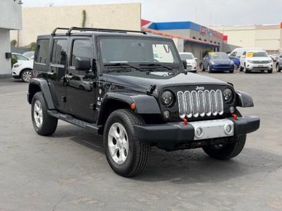 Used 2014 Jeep Wrangler Unlimited Sahara w/ Dual Top Group