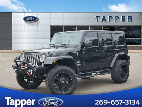 Used 2016 Jeep Wrangler Unlimited Sahara AWD/4WD image 1
