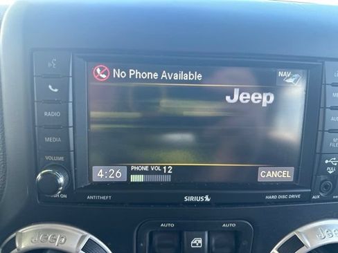 Used 2014 Jeep Wrangler Unlimited Sahara w/ Mopar Chrome Edition Group AWD/4WD image 19
